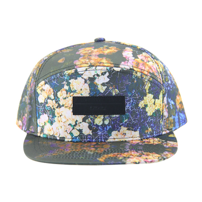 100% poliéster 7 Panel Snapback Sombrero de campamento personalizado con logotipo de parche de cuero en el frente